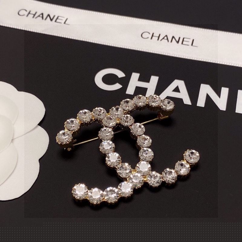 Ch*el brooches